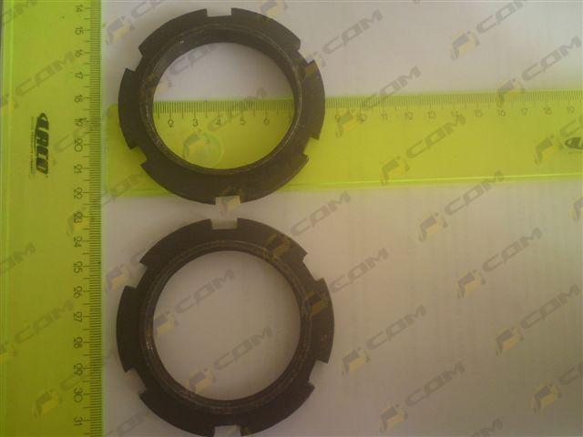 Гайка ведущего вала привода среднего моста (199012250031)